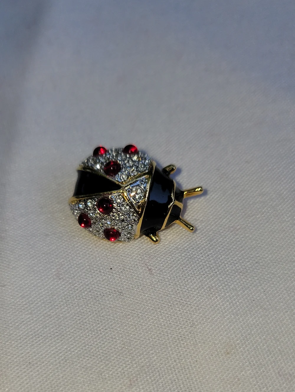 Vintage Joan Rivers Black Enamel and Red Crystal Ladybug Brooch
